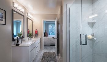 Expansive bathrooms with double vanities